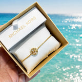 MICHAEL KORS BOXED CRYSTAL  LOGO SLIDER  BANGLE BRACELET GOLD PLATING MKJX7319710
