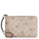 COACH CORNER ZIP WRISTLET IN SIGNATURE CANVAS WITH FLORAL PRINT SAND MULTI BEIGE  CAR20