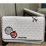 MICHAEL KORS COOPER LARGE EMBELLISHED SIGNATURE LOGO PASSPORT WALLET IN BRIGHT WHITE 36R5LC0F6B