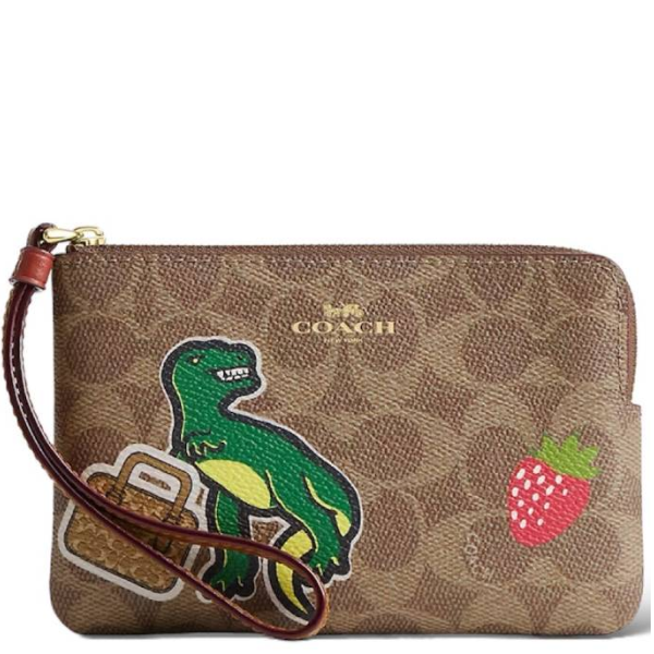 COACH CORNER ZIP WRISTLET IN SIGNATURE CANVAS WITH STICKER PRINT CW856