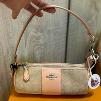 COACH NOLITA BARREL BAG IN SIGNATURE JACQUARD FADED BLUSH CU003