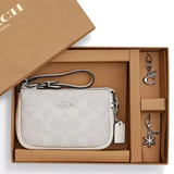 COACH BOXED SMALL NOLITA 15 IN SIGNATURE CANVAS WITH CHARMS CN045