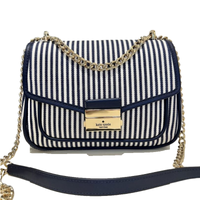 KATE SPADE CAREY SMALL FLAP SHOULDER BAG WITH STRIPED CANVAS IN BLUE MULTI KB552