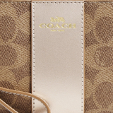 COACH CORNER ZIP WRISTLET IN SIGNATURE CANVAS IN LIGHT CHAMPAGNE CX255