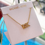 MICHAEL KORS GOLD-TONE BRASS PENDANT NECKLACE MKJX8024710