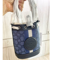 COACH MINI DEMPSEY BUCKET BAG IN SIGNATURE JACQUARD WITH STRIPE & PATCH  C8322