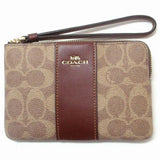 COACH CORNER ZIP WRISTLET IN SIGNATURE CANVAS  CW854 BROWN