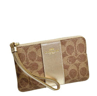 COACH CORNER ZIP WRISTLET IN SIGNATURE CANVAS IN LIGHT CHAMPAGNE CX255