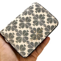 KATE SPADE NEW YORK SPADE FLOWER PVC COATED CANVAS SMALL BIFOLD WALLET KG493 IN BLACK MULTI