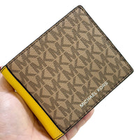 MICHAEL KORS COOPER SIGNATURE LOGO BILLFOLD WITH PASSCASE WALLET IN DAISY YELLOW 36S5LCOF2B