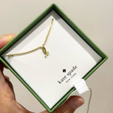 KATE SPADE BOXED NECKLACE LOWER L OR E LETTER ONE IN A MILLION GOLDEN