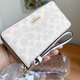 COACH ZIP AROUND LONG WALLET LARGE WRISTLET IN SIGNATURE CANVAS CW778 SAND / CHALK