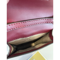 MICHAEL KORS CARMEN SMALL LOGO SMARTPHONE CROSSBODY BAG (MULBERRY) 35T2GNMC5L