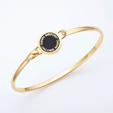 MARC JACOBS LOGO DISC HINGE BRACELET BLACK TONE M0008542